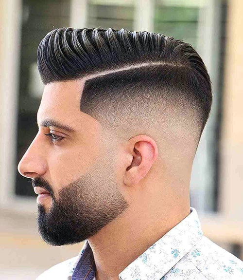 Attractive Comb Over Fade with Hard Part and Beard
