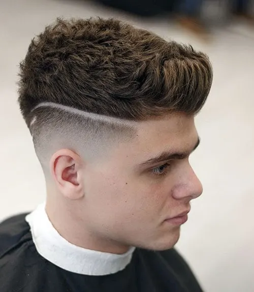Thick Brush Up with Low Razor Fade and Shaved Line Design