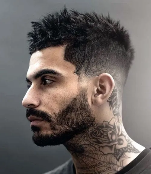 Short Messy Spikes with Low Fade and Kept Beard