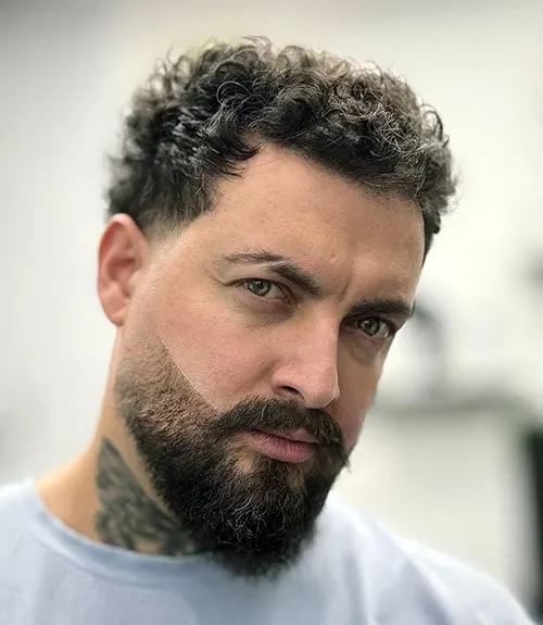 Short Curls with Thick Blended Facial Hair