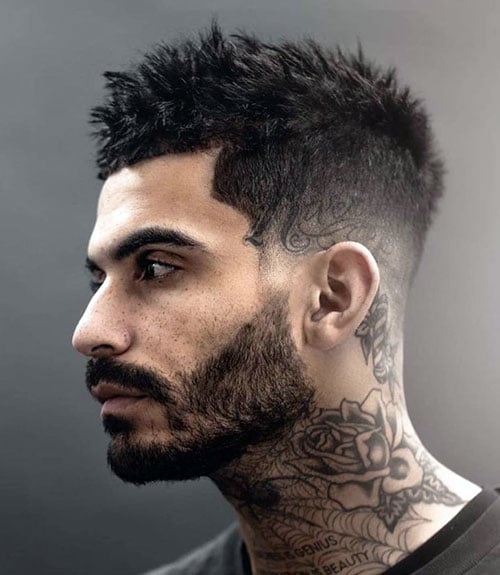 Short Messy Spikes with Low Fade and Kept Beard