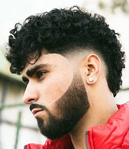 Curly Mohawk with Low Burst Fade and Short Beard