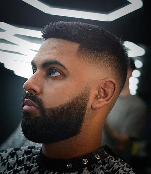 Short Textured Cut with Low Fade and Full Beard