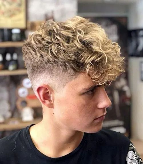 Thick Curly Top with Long Fringe and Mid Taper