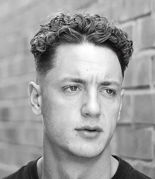 Short Curls with Off-Center Part and Low Fade