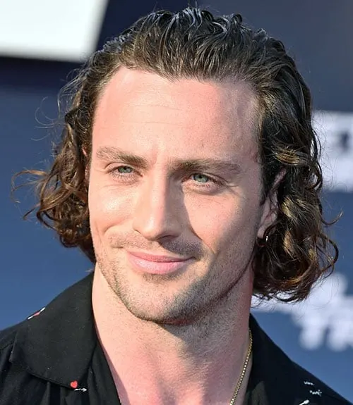 Men's Long Curly Flow Hairstyle