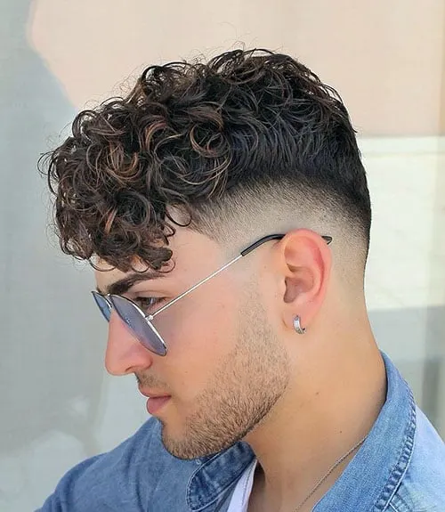 Modern Curly Hair Fade with Angular Fringe